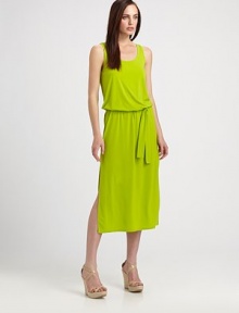 Made from soft jersey and featuring a self-tie detail at its elasticized waist, this dress is the epitome of stylish comfort.ScoopneckSleevelessSelf-tie belt at elasticized waistSide slitsAbout 38 from natural waist94% polyester/6% spandexMachine washImported Model shown is 5'10 (177cm) wearing US size Small. 