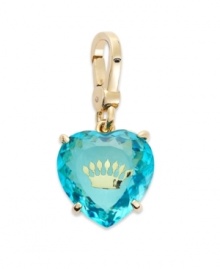 A real charmer. This Juicy Couture charm features a heart-shaped gem crafted from blue epoxy, engraved with a crown logo. Set in a four prong gold tone brass setting. Lobster clasp closure. Approximate drop: 1-1/2 inches.