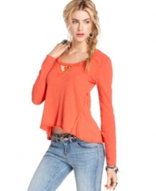 Southwest-inspired beading and a high-low hem infuses tons of style into this otherwise simple Free People top!