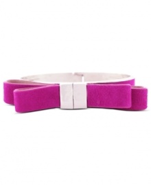 Look magical in magenta. This suede bow hinge bracelet from Vince Camuto is crafted from silver-tone mixed metal and offers a bit of a whimsical touch. Approximate diameter: 2-1/2 inches.