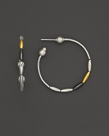 Bring new textures into your repertoire. Gurhan's hoop earrings are crafted from from hammered white silver with oblong beads in 24 Kt. yellow gold, white silver and dark silver.