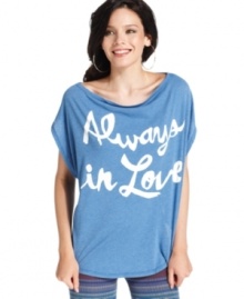 With an Always In Love print, this DREAMR tee features a stylishly slouchy shape -- perfect for a cute, casual look! With an Always In Love print, this DREAMR tee features a stylishly slouchy shape -- perfect for a cute, casual look!