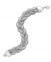 Braided beauty. This sophisticated Alfani bracelet features a twisted silhouette set in imitation rhodium tone mixed metal. Approximate length: 8 inches.