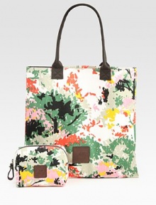 Beautifully printed canvas pairs with rich leather in this roomy carryall, and includes a removable matching cosmetic case.Leather double top handles, 7½ dropOne inside open pocketTop-zip cosmetic case15¼W X 15H X 6DImported Beautifully printed canvas pairs with rich leather in this roomy carryall, and includes a removable matching cosmetic case.Leather double top handles, 7½ dropOne inside open pocketTop-zip cosmetic case15¼W X 15H X 6DImported