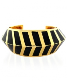 Style is the latest buzzword for Vince Camuto. This chevron-styled cuff bracelet is crafted from gold-tone mixed metal with black enamel for a bold touch. Approximate length: 6 inches.