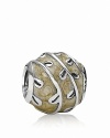 Organic lines and bright color bring this silver and enamel PANDORA charm to life.