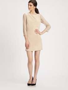 Elaborate lace sleeves add feminine charm to this cotton boatneck dress. BoatneckThree-quarter lace sleevesBack zipperFully linedAbout 19 from natural waistCottonDry cleanImportedModel shown is 5'10 (177cm) wearing US size 2.