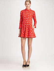 Timeless cotton dress in a feminine, vintage-inspired floral print with a funnelneck, pleated skirt and convenient back zipper. FunnelneckLong sleevesPleated skirtBack zipperAbout 19 from natural waistCottonDry cleanImportedModel shown is 5'10 (177cm) wearing US size 4.