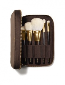 The Tom Ford Brush Set brings ease and luxury to applying your makeup. 5 brushes are meticulously crafted from the finest fibers to perform expertly with Tom Ford color cosmetics. The mahogany-brown, soft-sided portfolio, finished with Tom Ford's signature goldtone zipper, holds the TOM FORD Shade And Illuminate Brush, Bronzer Brush, Cheek Brush, Eye Shadow Contour Brush and Eye Shadow Brush. The Tom Ford Brush Set brings ease and luxury to applying your makeup. 5 brushes are meticulously crafted from the finest fibers to perform expertly with Tom Ford color cosmetics. The mahogany-brown, soft-sided portfolio, finished with Tom Ford's signature goldtone zipper, holds the TOM FORD Shade And Illuminate Brush, Bronzer Brush, Cheek Brush, Eye Shadow Contour Brush and Eye Shadow Brush.