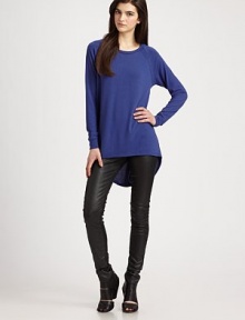Exaggerated hi-lo hem rejuvenates this supple jersey basic. RoundneckLong sleevesHi-lo hem48% polyester/48% rayon/4% spandexDry cleanMade in USAModel shown is 5'10 (177cm) wearing US size Small. Exaggerated hi-lo hem rejuvenates this supple jersey basic. RoundneckLong sleevesHi-lo hem48% polyester/48% rayon/4% spandexDry cleanMade in USAModel shown is 5'10 (177cm) wearing US size Small.