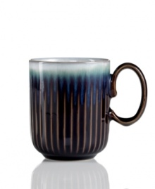 A rustic glaze, textured feel and rounded base make Denby's fluted mug a stylish go-to for cocoa, coffee and soup. Ultra-sturdy stoneware heats and reheats easily for everyday, anytime use. A rustic glaze, textured feel and rounded base make Denby's fluted mug a stylish go-to for cocoa, coffee and soup. Ultra-sturdy stoneware heats and reheats easily for everyday, anytime use.