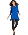 Kick back in style with Cha Cha Vente's comfy-chic tunic. The bold color and cut-outs at the neckline are fashion-forward details that instantly punch up basic leggings.