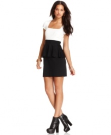 A peplum hem adds femme flair to this otherwise graphic black & white Bar III mini dress -- perfect for soiree style!