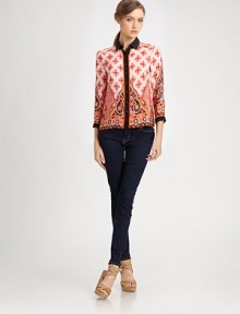 A duo of ladylike prints and bold trim flawlessly complement this luxe silk blouse.Collar neckThree-quarter sleevesButton-down styleBack yokeAllover printSolid trimAbout 21 from shoulder to hemSilkDry cleanMade in USA of imported fabricSIZE & FIT Model shown is 5'11 (180cm) wearing a US size 4. A duo of ladylike prints and bold trim flawlessly complement this luxe silk blouse.Collar neckThree-quarter sleevesButton-down styleBack yokeAllover printSolid trimAbout 21 from shoulder to hemSilkDry cleanMade in USA of imported fabricSIZE & FIT Model shown is 5'11 (180cm) wearing a US size 4.