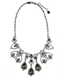 Dynamic and dazzling. Givenchy's collar necklace, crafted from hematite-tone mixed metal, is adorned with colorful glass stones and cubic zirconia accents for a bold statement. Approximate length: 16 inches + 2-inch extender.