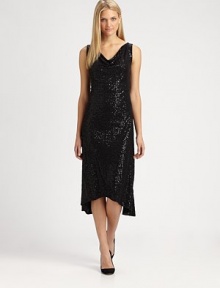 Shimmering sequins create a charming effect for this silk dress with a feminine dipped hem.Draped necklineSleevelessAllover sequinsDipped hemAbout 41 from shoulder to hemMerino woolDry cleanImportedSIZE & FIT Model shown is 5'10½ (179cm) wearing a US size Small. Shimmering sequins create a charming effect for this silk dress with a feminine dipped hem.Draped necklineSleevelessAllover sequinsDipped hemAbout 41 from shoulder to hemMerino woolDry cleanImportedSIZE & FIT Model shown is 5'10½ (179cm) wearing a US size Small.