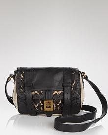 Compact style get a tough-chic with this leather and linen crossbody from Sam Edelman. Sized for both day and night, this two-tone bag will be your new round-the-clock essential. Compact style get a tough-chic with this leather and linen crossbody from Sam Edelman. Sized for both day and night, this two-tone bag will be your new round-the-clock essential.