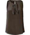 Elegant beluga silk top from Marc by Marc Jacobs - Inject your closet with sophisticated style with this sleeveless silk top - On-trend A-line silhouette with a chic tie-neck - Pair with flared jeans, a bold-shoulder blazer, and wedge heels - Try with ribbed leggings, an A-line wool coat, and over-the-knee boots