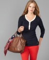 The classic henley shirt gets dressed up with thin metallic stripes and goldtone buttons in this Tommy Hilfiger look.