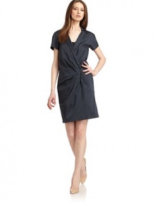 THE LOOKNotch lapelShort sleevesCrossover front snap closurePleated detailsSide seam pocketsTHE FITAbout 35 from shoulder to hemTHE MATERIAL65% cotton/31% polyamide/4% elastaneCARE & ORIGINDry cleanMade in ItalyModel shown is 5'10 (177cm) wearing US size 4. THE LOOKNotch lapelShort sleevesCrossover front snap closurePleated detailsSide seam pocketsTHE FITAbout 35 from shoulder to hemTHE MATERIAL65% cotton/31% polyamide/4% elastaneCARE & ORIGINDry cleanMade in ItalyModel shown is 5'10 (177cm) wearing US size 4.