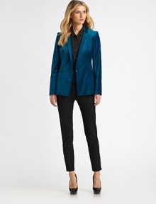 A classic blazer in luxe stretch velvet, tailored with subtle updates that take it from tradition to today.Narrow lapelsSingle snap closeFront welt pocketsFitted bodiceLong sleeves with one-button detail at cuffDouble back ventsFully linedAbout 27 from shoulder to hemCotton/viscose/elastaneDry cleanImportedSIZE & FITModel shown is 5'10½ (179cm) wearing US size 4. This style runs small. 