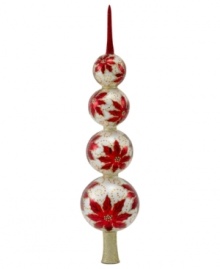 At over a foot tall, this impressive finial provides a stunning top to any tree. Four stacked ball ornaments hand painted with red poinsettias and dots of shimmering gold are a sight to behold every Christmas. At over a foot tall, this impressive finial provides a stunning top to any tree. Four stacked ball ornaments hand painted with red poinsettias and dots of shimmering gold are a sight to behold every Christmas.