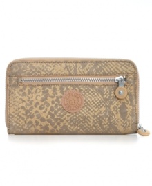 Get instantly organized with this slim Kipling wallet that discretely slips into your handbag and safely stores cash, coins, cards and ID, along with a few other extra essentials Get instantly organized with this slim Kipling wallet that discretely slips into your handbag and safely stores cash, coins, cards and ID, along with a few other extra essentials