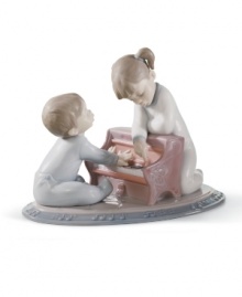 Play nice. Young musicians toil away on a miniature piano in a darling Lladro figurine that moms and dads will truly treasure. Play nice. Young musicians toil away on a miniature piano in a darling Lladro figurine that moms and dads will truly treasure.
