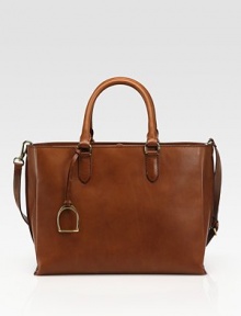 Roomy carryall crafted from luxurious leather with dual straps for carrying versatility.Double top handles, 5½ dropAdjustable, removable shoulder strap, 13-16½ dropMagnetic snap closureProtective metal feetOne inside zip pocketTwo inside open pocketsCanvas lining14W X 10½H X 5½DMade in Italy Roomy carryall crafted from luxurious leather with dual straps for carrying versatility.Double top handles, 5½ dropAdjustable, removable shoulder strap, 13-16½ dropMagnetic snap closureProtective metal feetOne inside zip pocketTwo inside open pocketsCanvas lining14W X 10½H X 5½DMade in Italy
