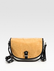 Sumptuous colorblocked leather in a rounded flap silhouette with a chic studded crossbody strap.Crossbody strap, 17 dropMagnetic snap and flap closureProtective metal feetOne inside zip pocketOne inside open pocketCotton lining12¼W X 7½H X 5¾DImported Sumptuous colorblocked leather in a rounded flap silhouette with a chic studded crossbody strap.Crossbody strap, 17 dropMagnetic snap and flap closureProtective metal feetOne inside zip pocketOne inside open pocketCotton lining12¼W X 7½H X 5¾DImported
