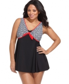 A fun print and colorful trim equal a bold beach statement! Fit 4 U's plus size swimdress gives you the cute look you love with the coverage you want. A fun print and colorful trim equal a bold beach statement! Fit 4 U's plus size swimdress gives you the cute look you love with the coverage you want.