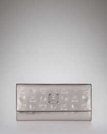 There's no spot more stellar for your riches than MCM's silver wallet. Slip it in your bag during daily errands, but this glamorous compact is ready for it's close up as a clutch after hours. There's no spot more stellar for your riches than MCM's silver wallet. Slip it in your bag during daily errands, but this glamorous compact is ready for it's close up as a clutch after hours.