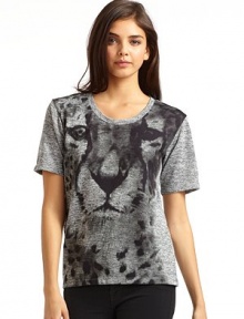 THE LOOKScoop neckShort sleevesCheetah graphicTHE FITAbout 24 from shoulder to hemTHE MATERIAL95% polyester/5% spandexCARE & ORIGINMachine washMade in USA THE LOOKScoop neckShort sleevesCheetah graphicTHE FITAbout 24 from shoulder to hemTHE MATERIAL95% polyester/5% spandexCARE & ORIGINMachine washMade in USA