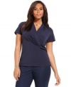 A cross front lends a slenderizing line to Charter Club's short sleeve plus size top-- dress it up with trousers or down with denim.