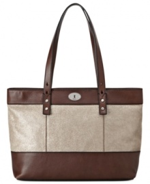 Opt for artisanal accessorizing with this chic colorblock shopper from Fossil. Buttery-soft leather is outfitted with signature detailing, while the generous interior easily stows, eReader, PDA, makeup case, and more. Opt for artisanal accessorizing with this chic colorblock shopper from Fossil. Buttery-soft leather is outfitted with signature detailing, while the generous interior easily stows, eReader, PDA, makeup case, and more.