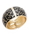 Stack your wrists with bold, vibrant styles. Charter Club's fancy bangle bracelet features a scrolling pattern in black enamel. Crafted in gold tone mixed metal. Secures with a hinge clasp. Approximate diameter: 2-1/2 inches.