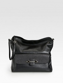 Slouchy crossbody design in supple leather with an adjustable strap and convenient front pocket. Adjustable crossbody strap, 18½-20½ dropMagnetic top closureOne outside open pocketOne inside zip pocketTwo inside open pocketsCotton lining13W X 11H X 5DImported Slouchy crossbody design in supple leather with an adjustable strap and convenient front pocket. Adjustable crossbody strap, 18½-20½ dropMagnetic top closureOne outside open pocketOne inside zip pocketTwo inside open pocketsCotton lining13W X 11H X 5DImported
