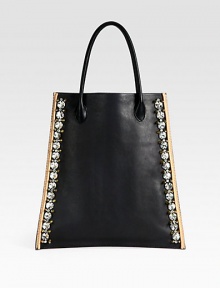 A modern and avant-garde brand with beautifully-crafted pieces such as this luxurious leather design embellished with sparkling stones and studs with contrasting trim.Top handles, 11 dropOpen topInside pocketFully lined11½W X 13½H X 3¾DMade in Italy A modern and avant-garde brand with beautifully-crafted pieces such as this luxurious leather design embellished with sparkling stones and studs with contrasting trim.Top handles, 11 dropOpen topInside pocketFully lined11½W X 13½H X 3¾DMade in Italy
