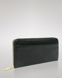 Tusk's sleek leather wallet keeps your cash and card collection in working order. Slip the rich little package in your bag or let it work overtime as a clutch at cocktail hour. Tusk's sleek leather wallet keeps your cash and card collection in working order. Slip the rich little package in your bag or let it work overtime as a clutch at cocktail hour.