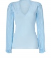 Lady-chic looks get a decidedly feminine finish in Emilio Puccis ultra glamorous soft azure pullover, finished with pleated long sleeves in exquisitely chic billowing sheer silk - V-neckline, long pleated sleeves, gathered buttoned cuffs, slim straight fit - Team with tailored separates and a shimmer of sparkly fine jewelry