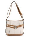 Buckle up and get on board this season with Tignanelllo's soft cinch double-entry hobo bag featuring contrast colors and silhouette-enhancing stitching. The strap is extra long so you can wear it crossbody style.