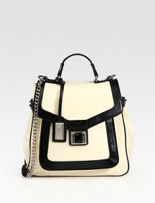 Gorgeous colorblock leather in a lady-like satchel finished with a chic chain-strap and jeweled turnlock closure.Top handle, 7 dropRemovable shoulder strap, 19½ dropTurnlock flap closureOne outside pocket under flapOne inside zip pocketTwo inside open pocketsOne money clipFully lined10¾W X 11H X 5½DImported Gorgeous colorblock leather in a lady-like satchel finished with a chic chain-strap and jeweled turnlock closure.Top handle, 7 dropRemovable shoulder strap, 19½ dropTurnlock flap closureOne outside pocket under flapOne inside zip pocketTwo inside open pocketsOne money clipFully lined10¾W X 11H X 5½DImported