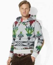 A bold Western-inspired print adorns a handsome fleece hoodie with a shawl collar and distressed leather patches at the elbows for a polished yet free-spirited feel. A bold Western-inspired print adorns a handsome fleece hoodie with a shawl collar and distressed leather patches at the elbows for a polished yet free-spirited feel.