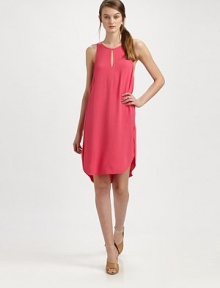 Silky viscose knit from Italy is styled with subtle details that take it from a simple tank to a shapely statement.Round neckline with center cutoutSleeveless with dropped arm openingsOverlapped side seamsContour hem, slightly longer in backPullover stylingAbout 17 from natural waistVicoseDry cleanImported