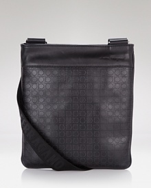 This sleek crossbody bag is adorned with Salvatore Ferragamo's signature Gancini logo allover. This sleek crossbody bag is adorned with Salvatore Ferragamo's signature Gancini logo allover.