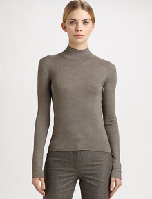 A melange cashmere/silk blend makes up this sleek, form-fitting piece.Mock neckLong sleeves50% cashmere/50% silkDry cleanMade in SwitzerlandModel shown is 5'11 (180cm) wearing US size 4. A melange cashmere/silk blend makes up this sleek, form-fitting piece.Mock neckLong sleeves50% cashmere/50% silkDry cleanMade in SwitzerlandModel shown is 5'11 (180cm) wearing US size 4.