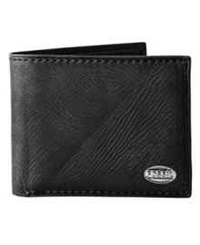 Rich texturized leather gives our Sulley Traveler wallet a vintage feel. It has multiple card slots and slip pockets for all of your daily essentials. A metal logo plaque finishes the look. Rich texturized leather gives our Sulley Traveler wallet a vintage feel. It has multiple card slots and slip pockets for all of your daily essentials. A metal logo plaque finishes the look.