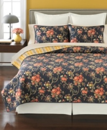 Beauty in bloom. Create a relaxing retreat in your space with this Evening Garden sham from Martha Stewart Collection, featuring a luxurious landscape of delicate buds on a deep, rich backdrop. Flip the quilt for a bright yellow strip pattern.