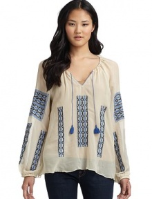 THE LOOKSheer designRound split-neck with tie tassel closureLong elastic cuff sleevesTonal embroidered necklineContrast embroidered accentsTHE FITAbout 26 from shoulder to hemTHE MATERIALSilkCARE & ORIGINDry cleanImportedModel shown is 5'10 (177cm) wearing US size Small. THE LOOKSheer designRound split-neck with tie tassel closureLong elastic cuff sleevesTonal embroidered necklineContrast embroidered accentsTHE FITAbout 26 from shoulder to hemTHE MATERIALSilkCARE & ORIGINDry cleanImportedModel shown is 5'10 (177cm) wearing US size Small.