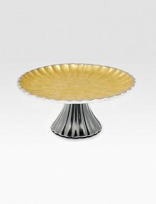 A beautiful stage for a freshly baked dessert, individually crafted and hand-colored in fluted metal with an opalescent, crushed mother-of-pearl enamel. Food safe Engraved signature 4¼H X 10 diam. Hand wash Imported A beautiful stage for a freshly baked dessert, individually crafted and hand-colored in fluted metal with an opalescent, crushed mother-of-pearl enamel. Food safe Engraved signature 4¼H X 10 diam. Hand wash Imported